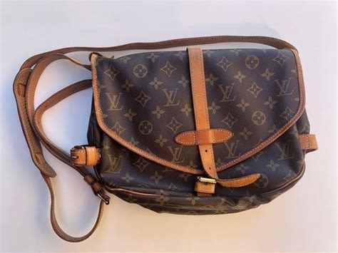 sacca marrone contenente la borsa di louis vuitton|Sacca a tracolla saumur 30 monogramma di Louis Vuitton in .